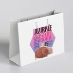 Sac en papier au design d'un évènement - Graphiste événementiel Tourcoing freelance